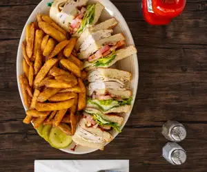 Turkey Club Sandwich and Fries